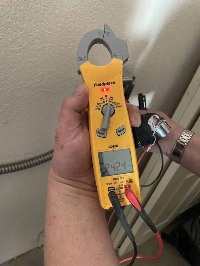 Voltage testing with clamp meter during Generator Installation in Florence-Graham